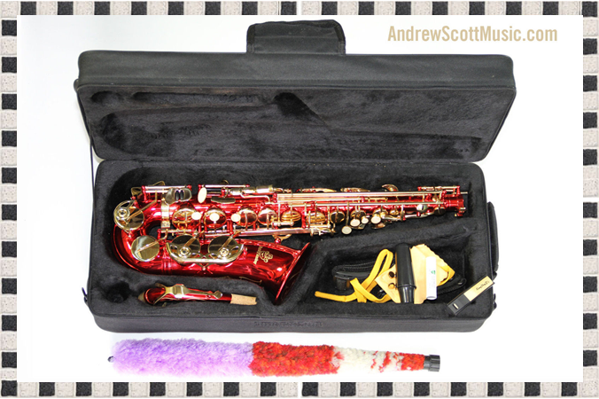 Red and Gold Alto Saxophone in Case